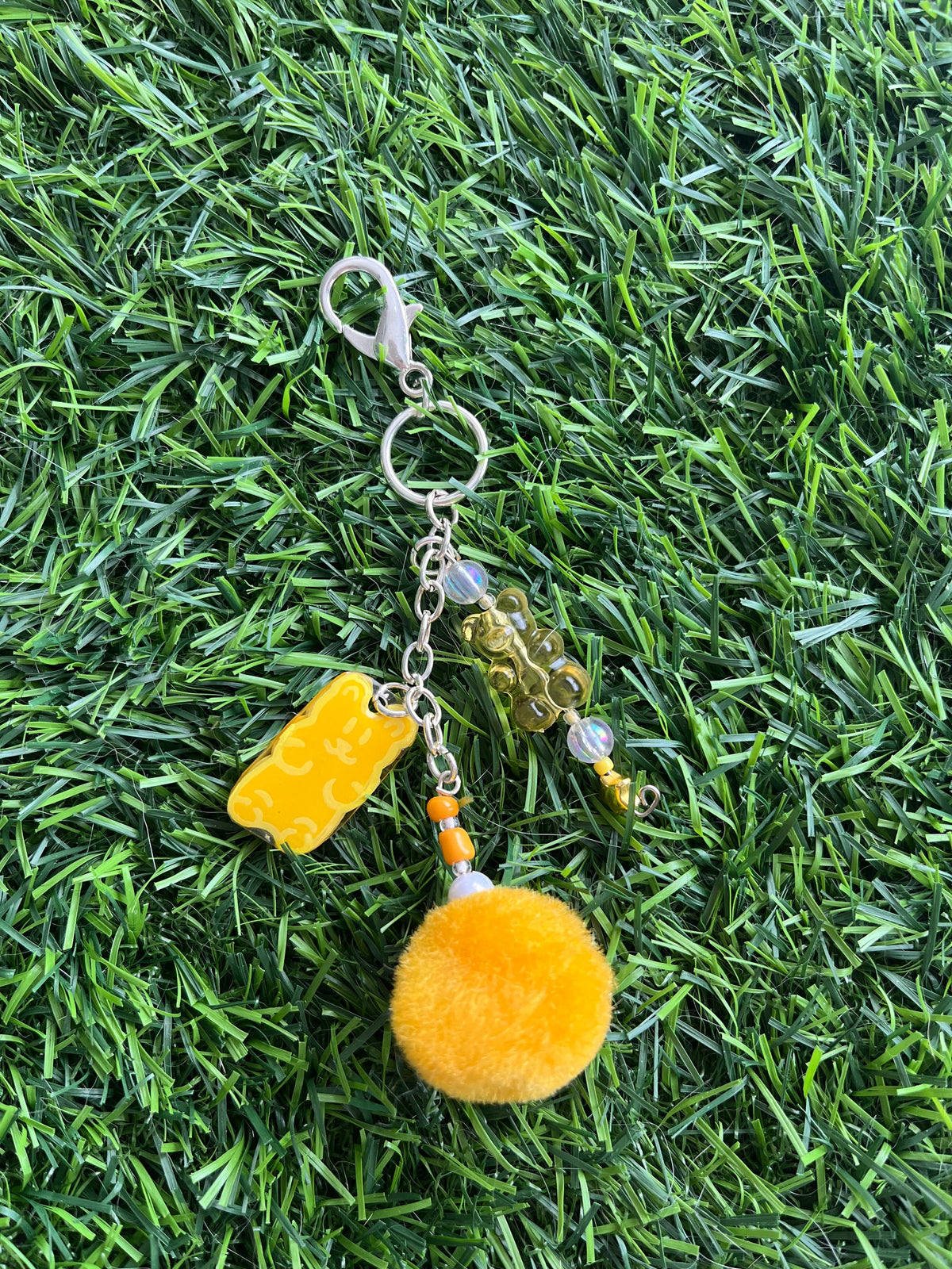 Peach gummy bear keychain with pom pom