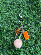 Purple gummy bear keychain with pom pom