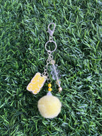 Red gummy bear keychain with pom pom
