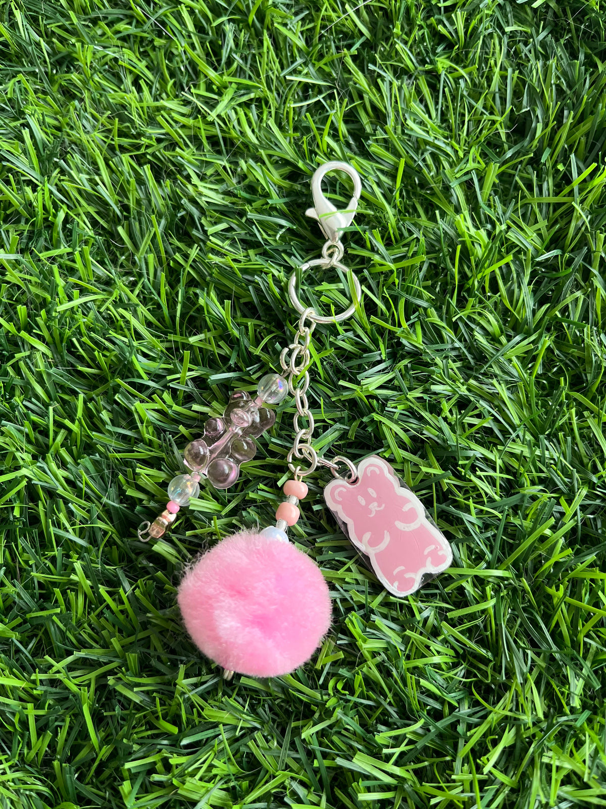 Yellow gummy bear keychain with pom pom
