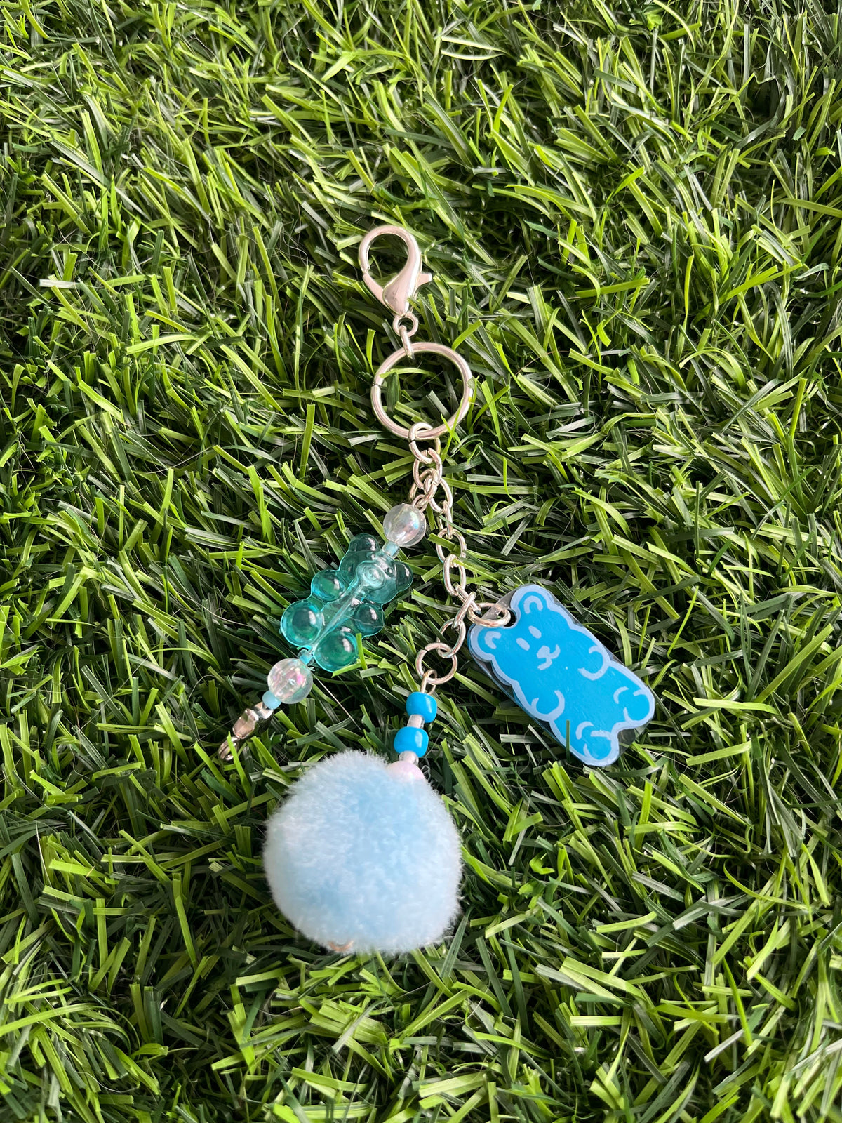 Green gummy bear keychain with pom pom
